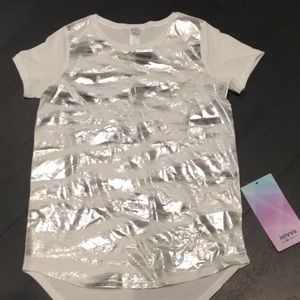 A girls ivivva shirt that is not used